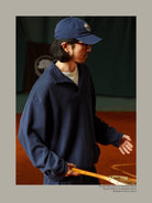 USAGE Oversized Textured Long Sleeve Polo in Navy Blue - On Male Model