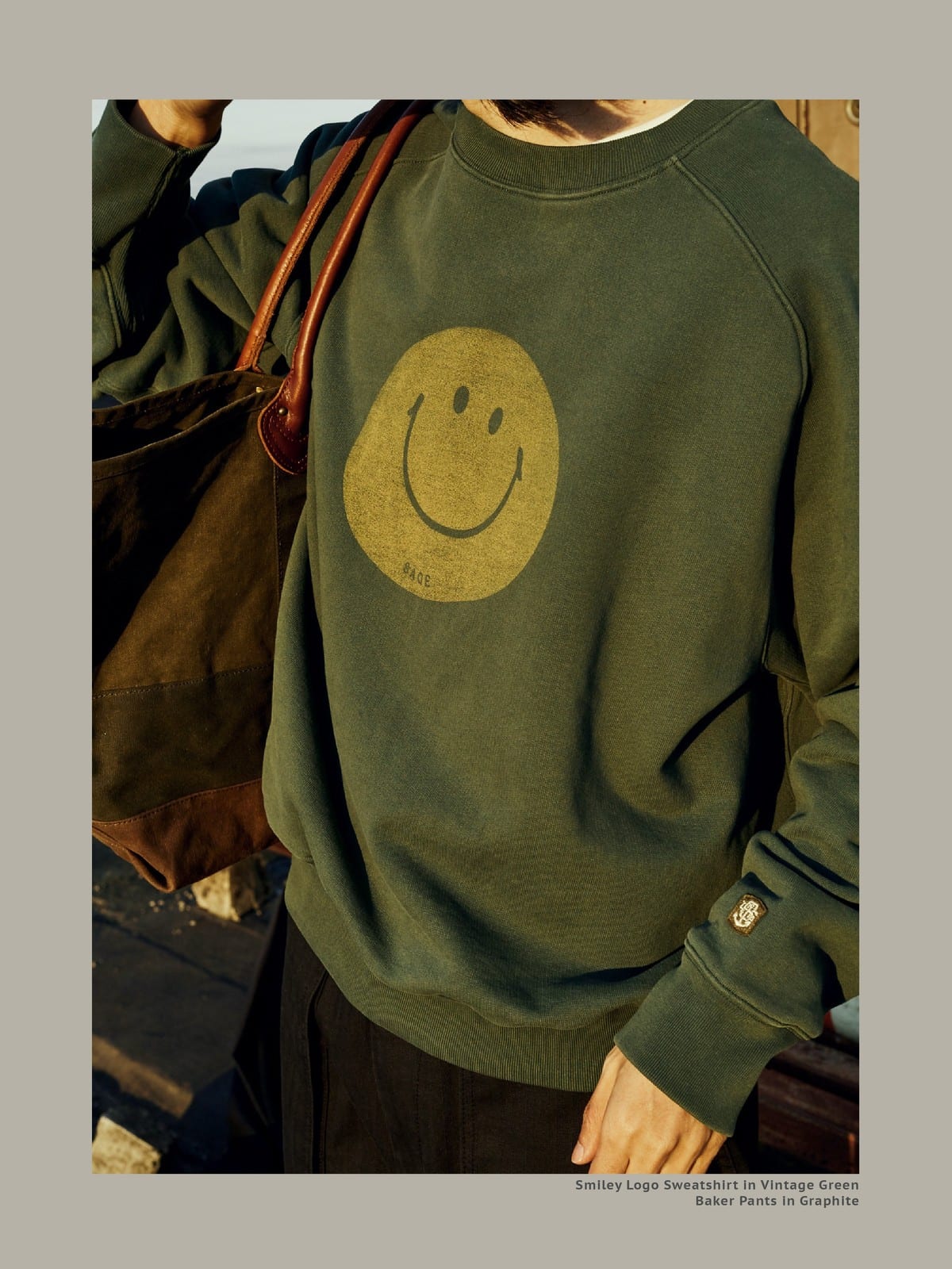 USAGE Washed Cotton Raglan Smiley Sweatshirt in Mint - On Male Model