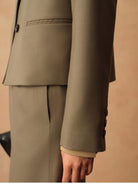 TEASEL Merino Wool Pleated Trousers in Olive - On Model