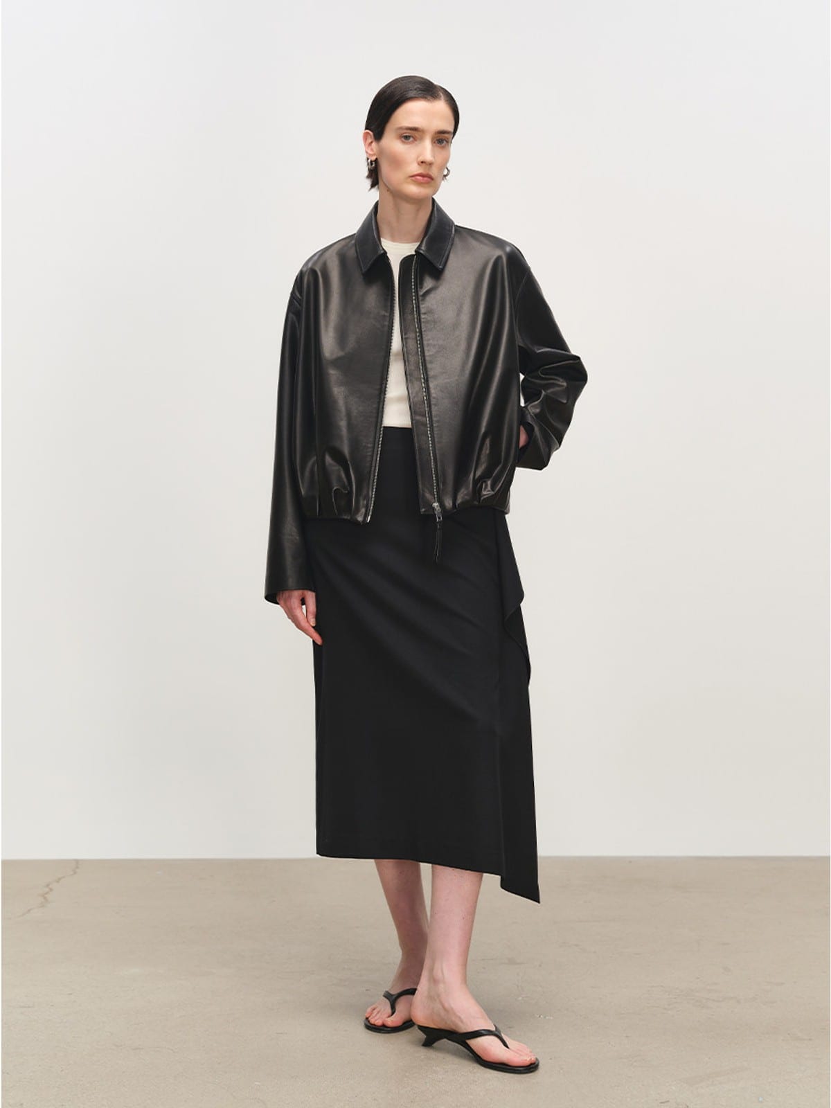 MSBEAST Gathered Hem Sheep Leather Jacket in Black - On Female Model