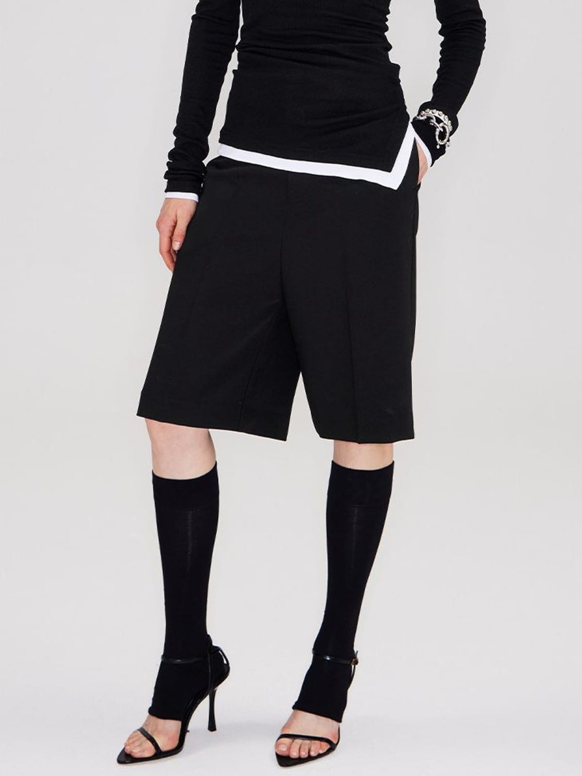 RARELY ALIKE Tailored Bermuda Shorts in Black - On Female Model