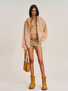 SMFK Cross Embroidered Zip Up Hoodie in Beige - On Female Model