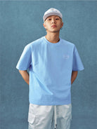 MEDM Letter Embroidery Cotton T Shirt in Sky Blue - On Male Model