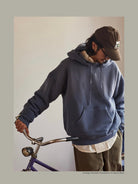 USAGE Faded Vintage Wash Hoodie in Blue - On Male Model