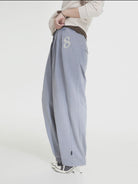 MASONPRINCE Wide Leg Inverted Pleat Sweatpants in Purple - On Model