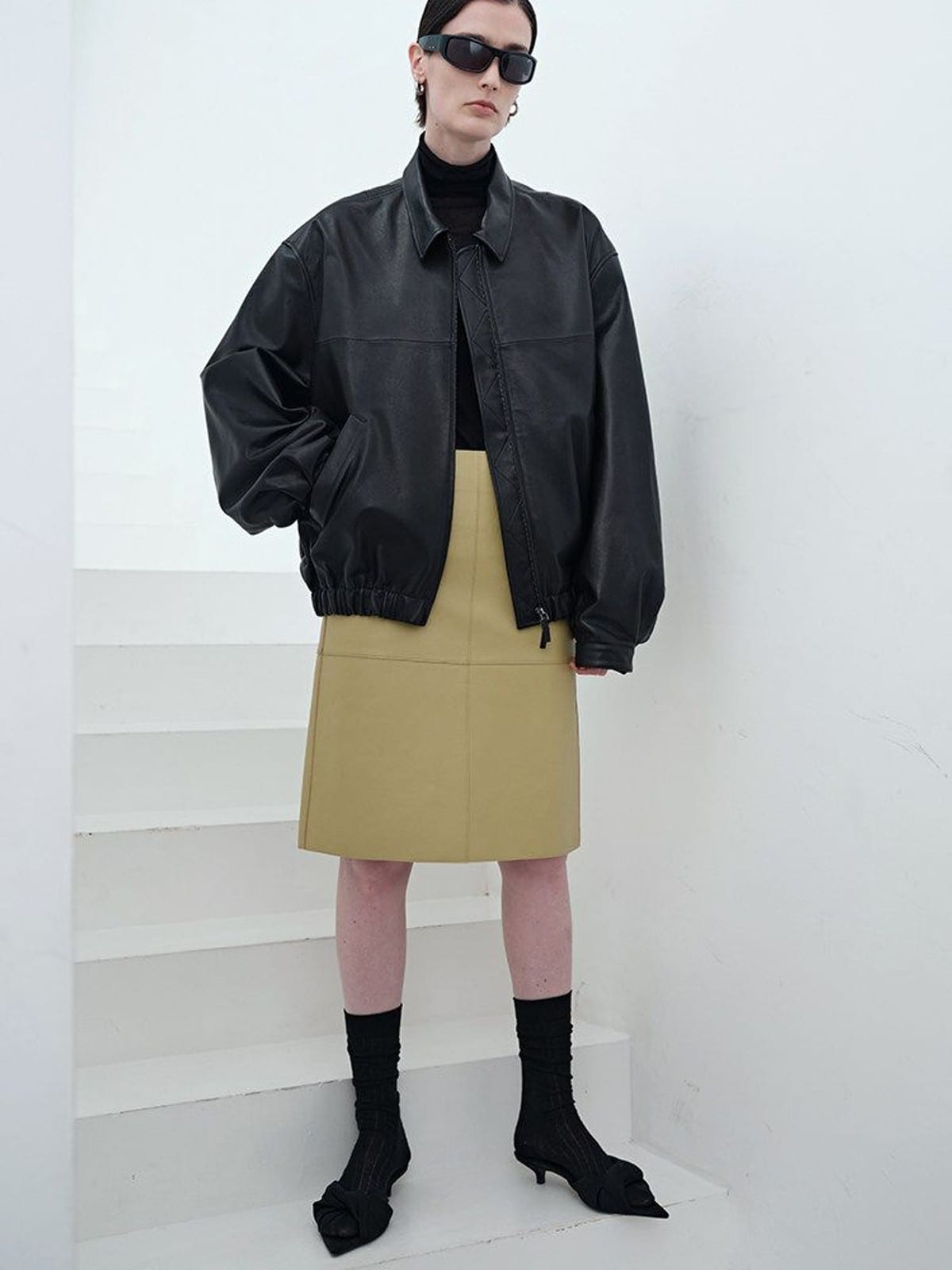 MSBEAST Broad Shoulder Sheepskin Jacket in Black - On Female Model