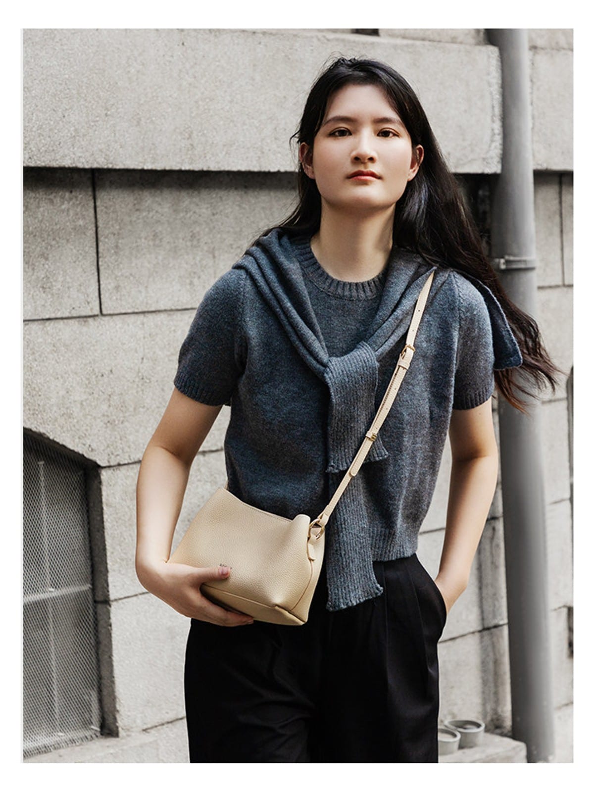 HONGU Cowhide Crossbody Bucket Bag in Beige - On Female Model
