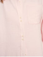 TEASEL Crinkled Silk Blend Short Sleeve Top in Pink - On Female Model