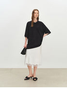 MSBEAST Sheer Lyocell Cashmere Half Sleeve T Shirt in Black - On Female Model