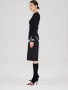 RARELY ALIKE Tailored Bermuda Shorts in Black - On Female Model