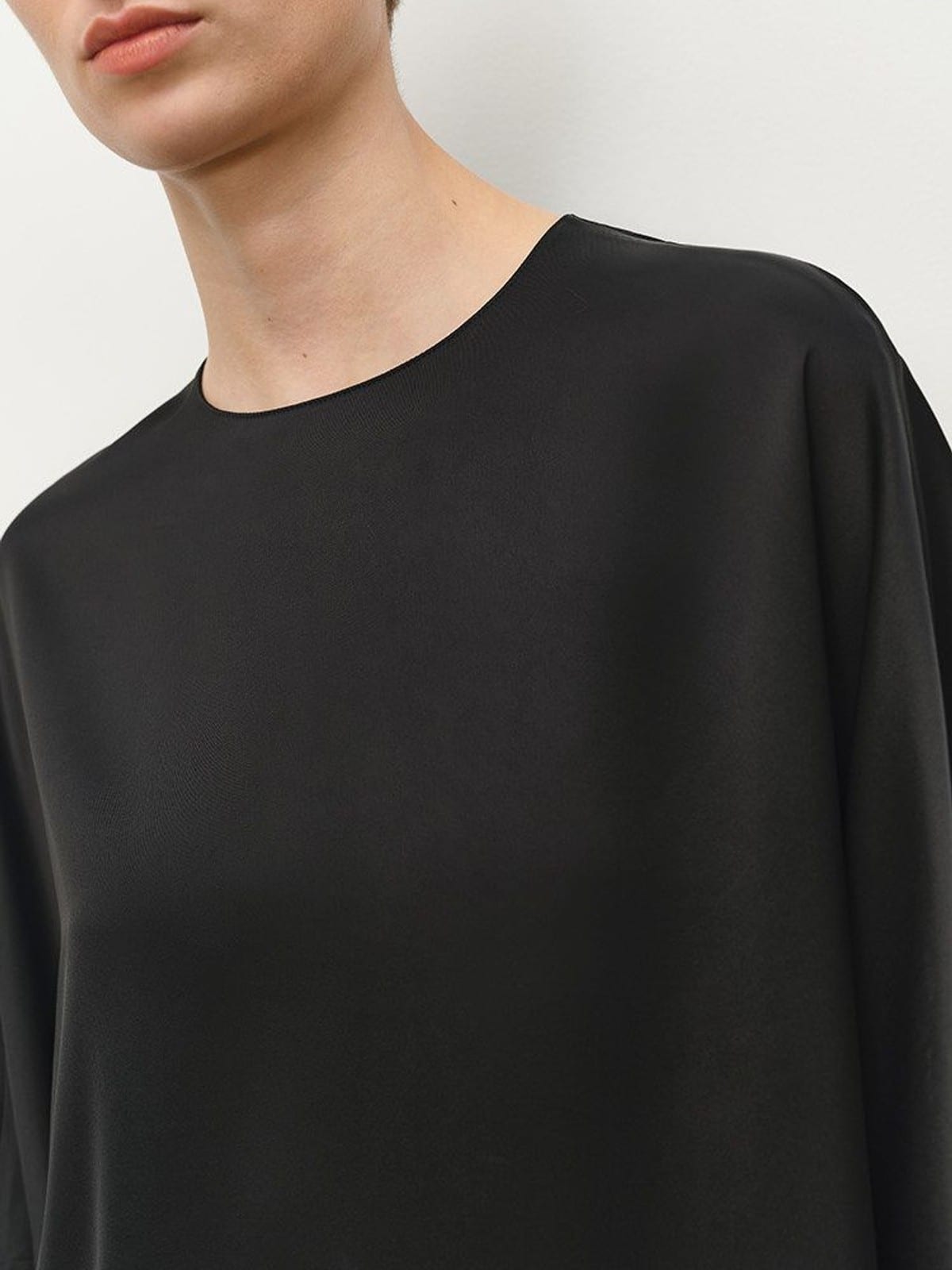 MSBEAST Oversized Acetate Satin T Shirt in Black - On Female Model