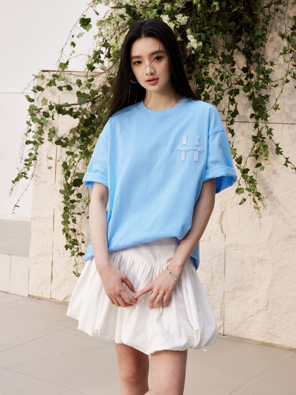 MEDM Tufted Logo Cotton T Shirt in Sky Blue - On Female Model