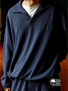 USAGE Oversized Textured Long Sleeve Polo in Navy Blue - On Male Model