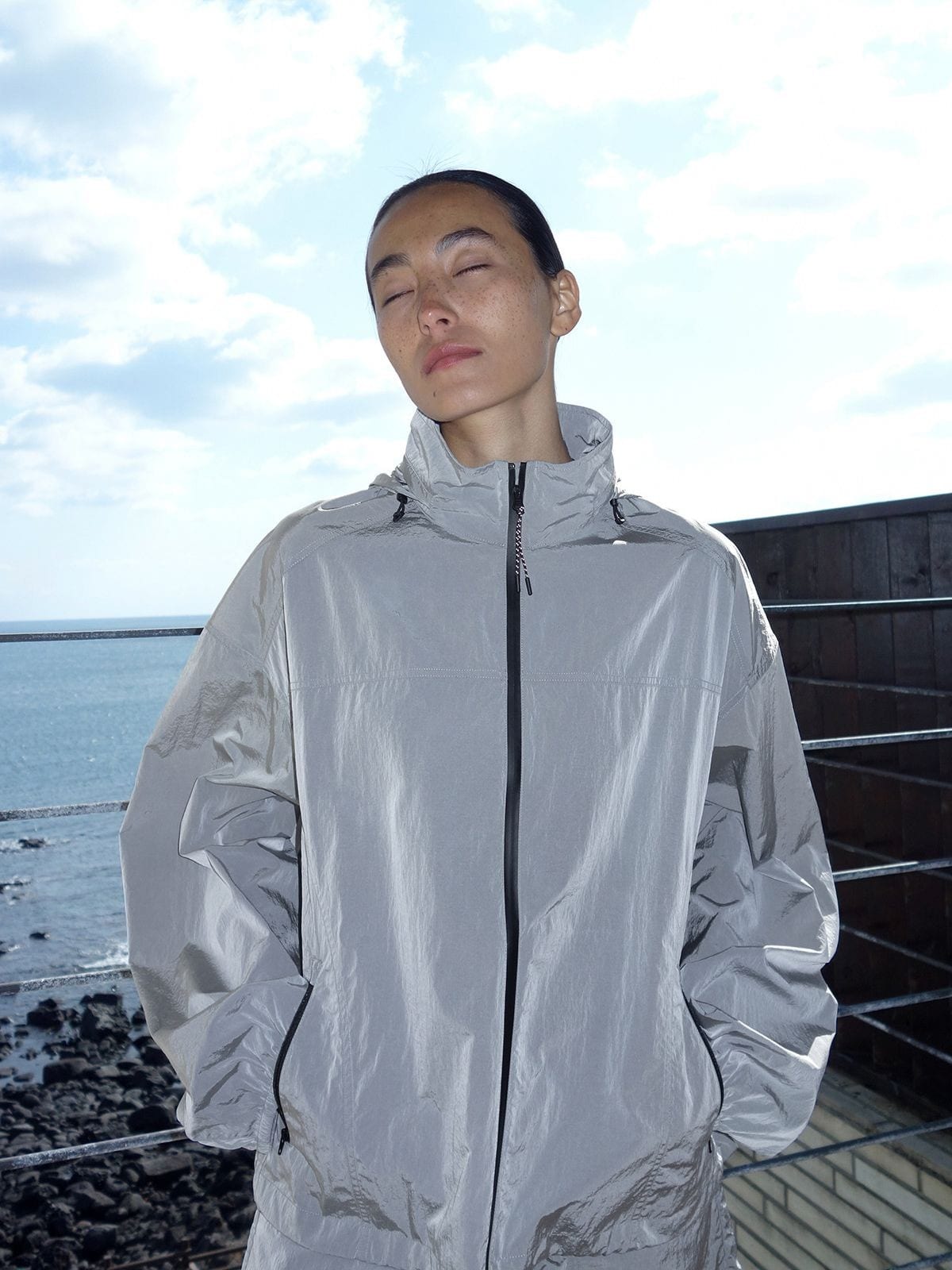 Random Piece Lightweight Cropped Hooded Nylon Jacket in Gray - On Female Model