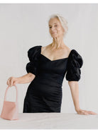 PANLULUPAN Waxed Cowhide Square Shoulder Bag in Pink - On Female Model
