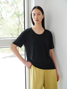 MSBEAST Rolled Edge Silk Cotton U Neck T Shirt in Black - On Female Model