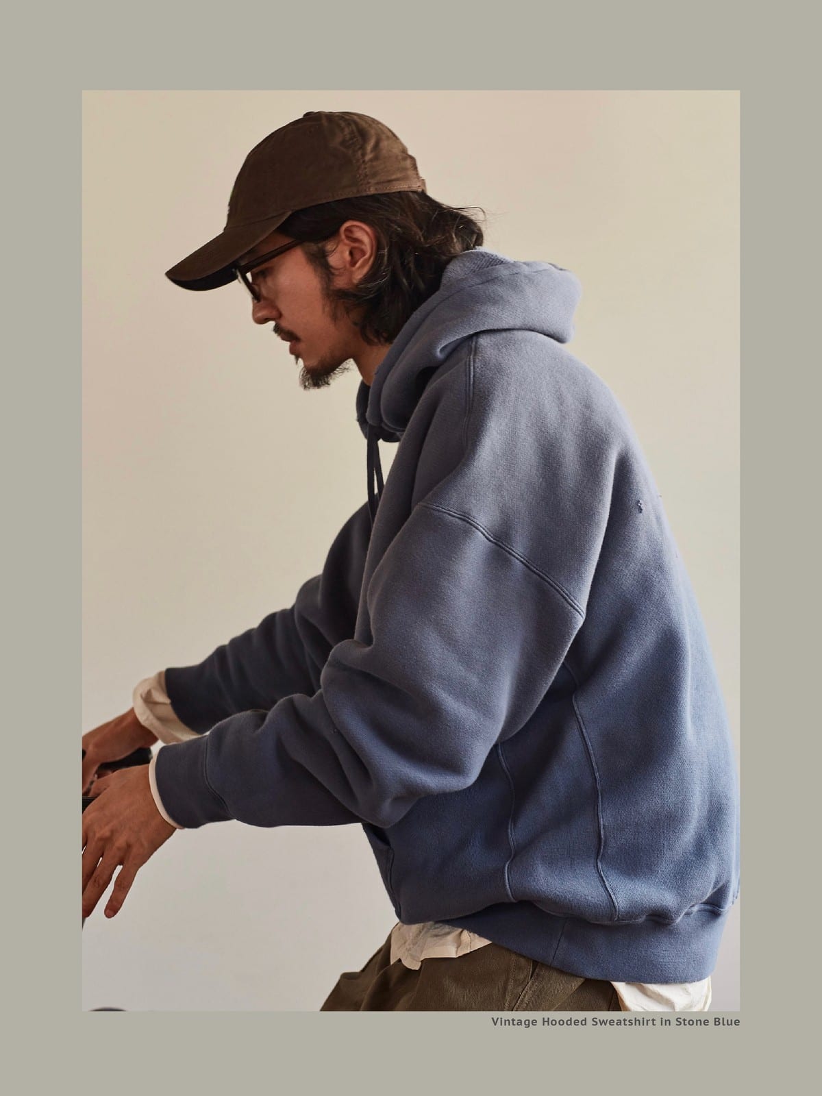 USAGE Faded Vintage Wash Hoodie in Blue - On Male Model