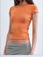 RARELY ALIKE Hourglass Cotton Crew Neck T Shirt in Orange - On Female Model