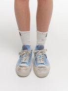 SMFK Distressed Canvas Skate Sneakers in Sky Blue - On Model