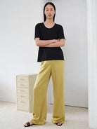 MSBEAST Oversized Acetate Satin T Shirt in Black - On Female Model
