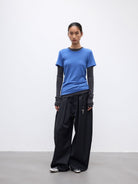Random Piece Merino Wool U Neck Short Sleeve T Shirt in Blue - On Female Model