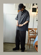 USAGE Cotton Crinkle Short Sleeve Shirt in Navy Blue - On Male Model