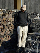 USAGE Pleated Cotton Twill Chinos in White - On Male Model