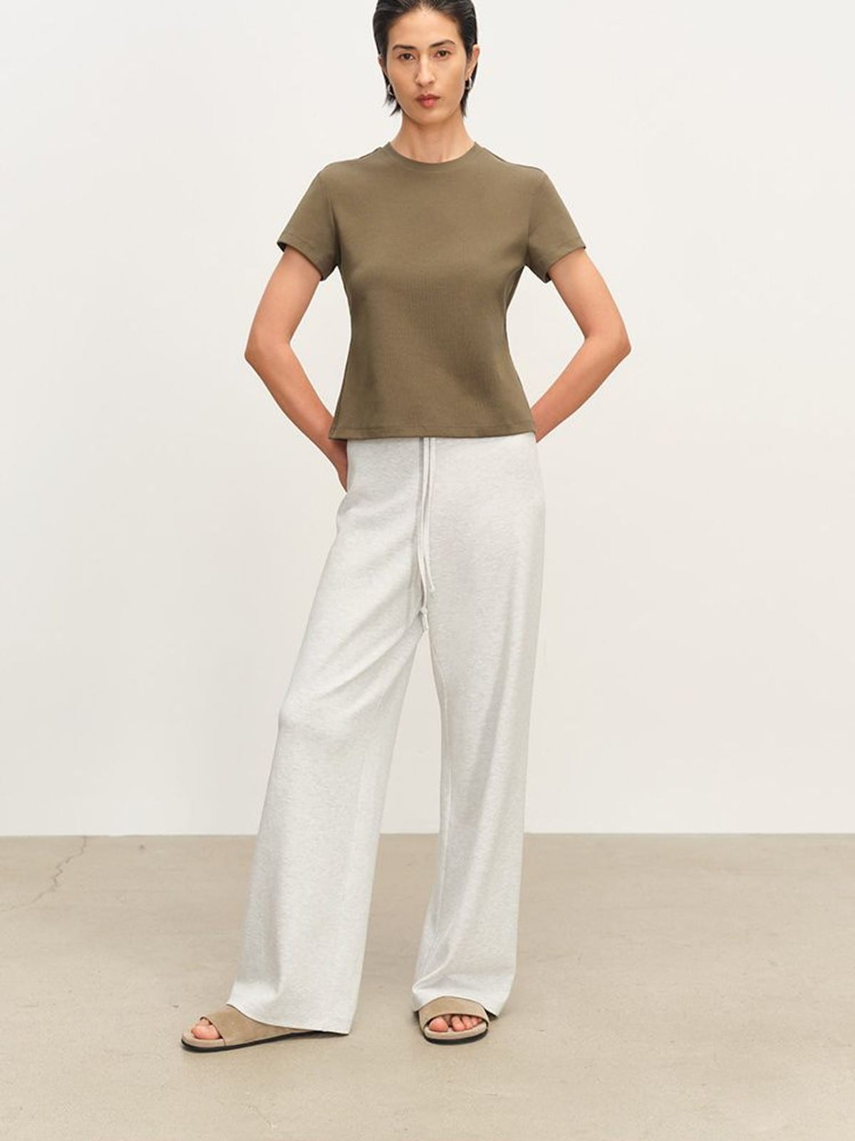 MSBEAST Cotton Blend Tapered Waist T Shirt in Olive - On Female Model