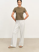 MSBEAST Cotton Blend Tapered Waist T Shirt in Olive - On Female Model