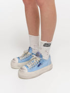 SMFK Distressed Canvas Skate Sneakers in Sky Blue - On Model