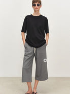 MSBEAST Oversized Lyocell Wool Blend T Shirt in Black - On Female Model