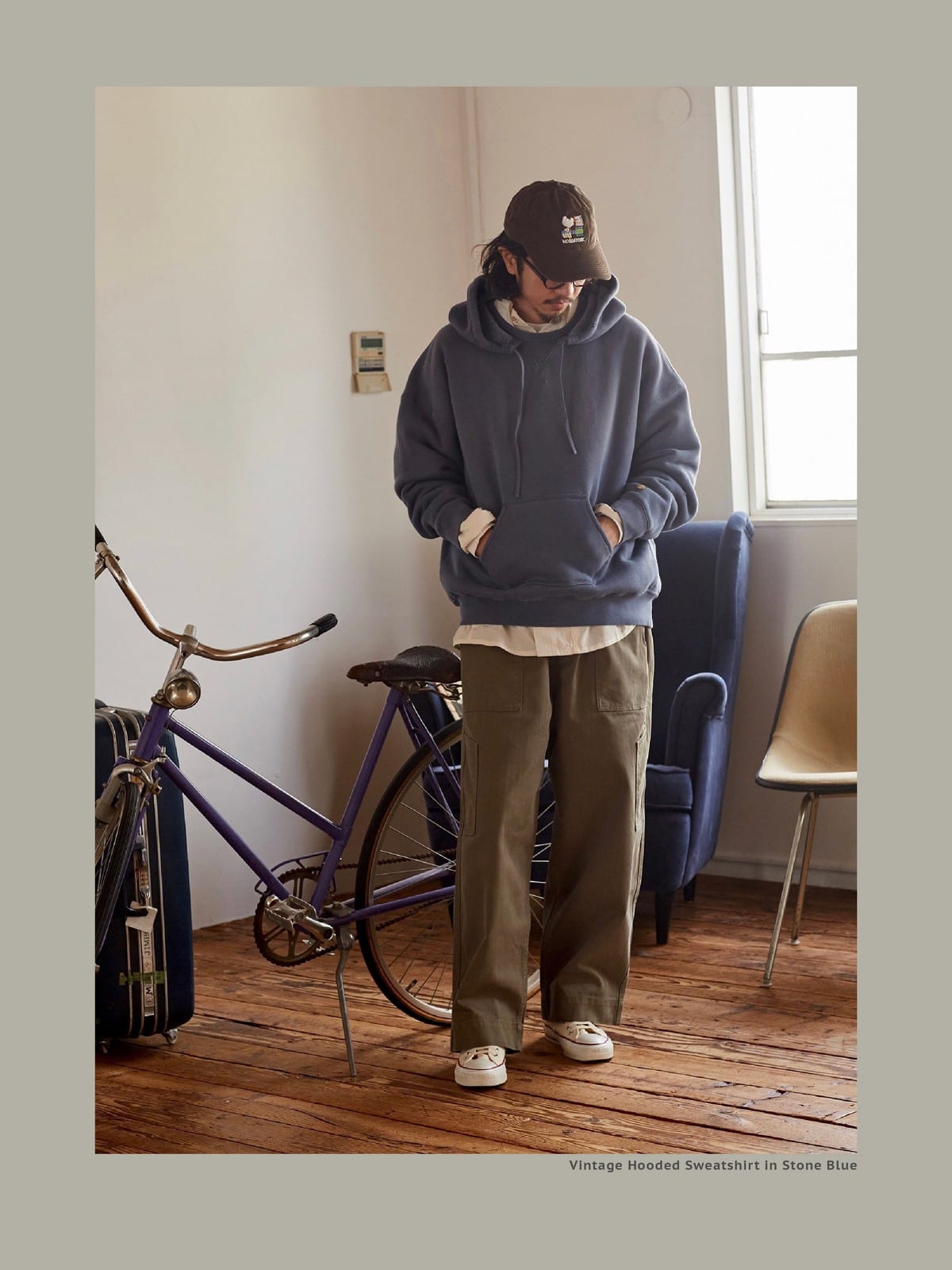 USAGE Faded Vintage Wash Hoodie in Blue - On Male Model