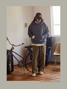 USAGE Faded Vintage Wash Hoodie in Blue - On Male Model
