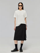 SIMPLE PROJECT Textured Diagonal Paneled T Shirt in White - On Female Model