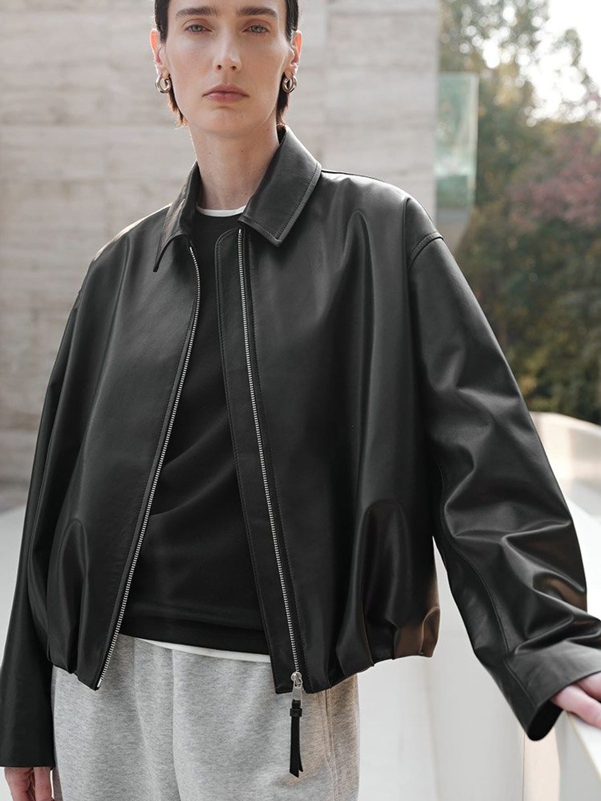 MSBEAST Gathered Hem Sheep Leather Jacket in Black - On Female Model
