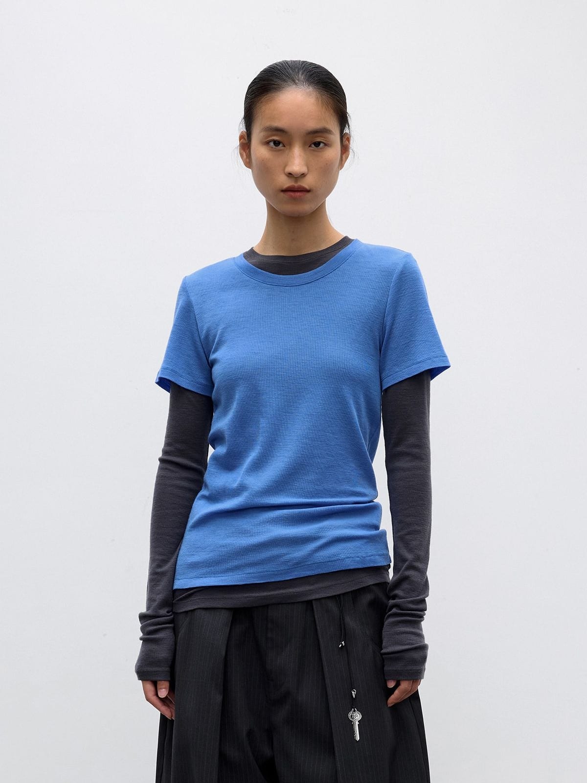 Random Piece Merino Wool U Neck Short Sleeve T Shirt in Blue - On Female Model