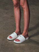SMFK Leather Cross Detail Slide Sandals in White - On Model