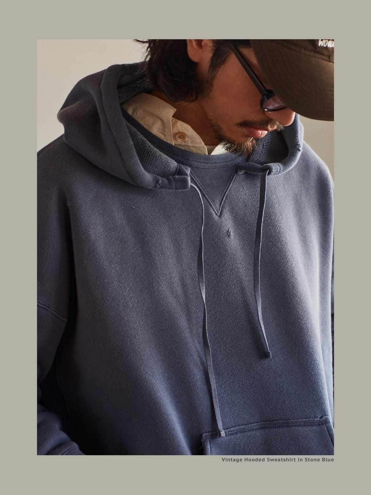 USAGE Faded Vintage Wash Hoodie in Blue - On Male Model
