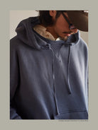 USAGE Faded Vintage Wash Hoodie in Blue - On Male Model