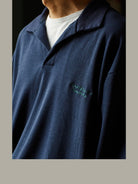 USAGE Oversized Textured Long Sleeve Polo in Navy Blue - On Male Model