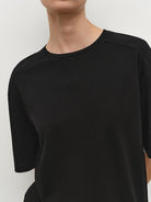 MSBEAST Oversized Lyocell Wool Blend T Shirt in Black - On Female Model
