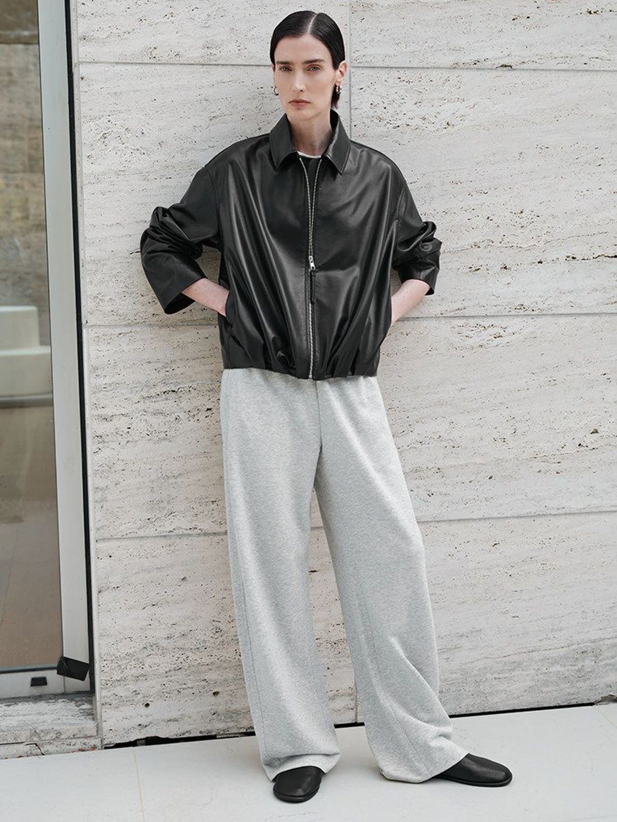 MSBEAST Gathered Hem Sheep Leather Jacket in Black - On Female Model