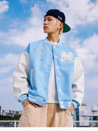 MEDM Pearl Embellished Varsity Jacket in Sky Blue - On Male Model