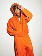 MEDM Polar Fleece Zip Up Hoodie in Orange - On Male Model