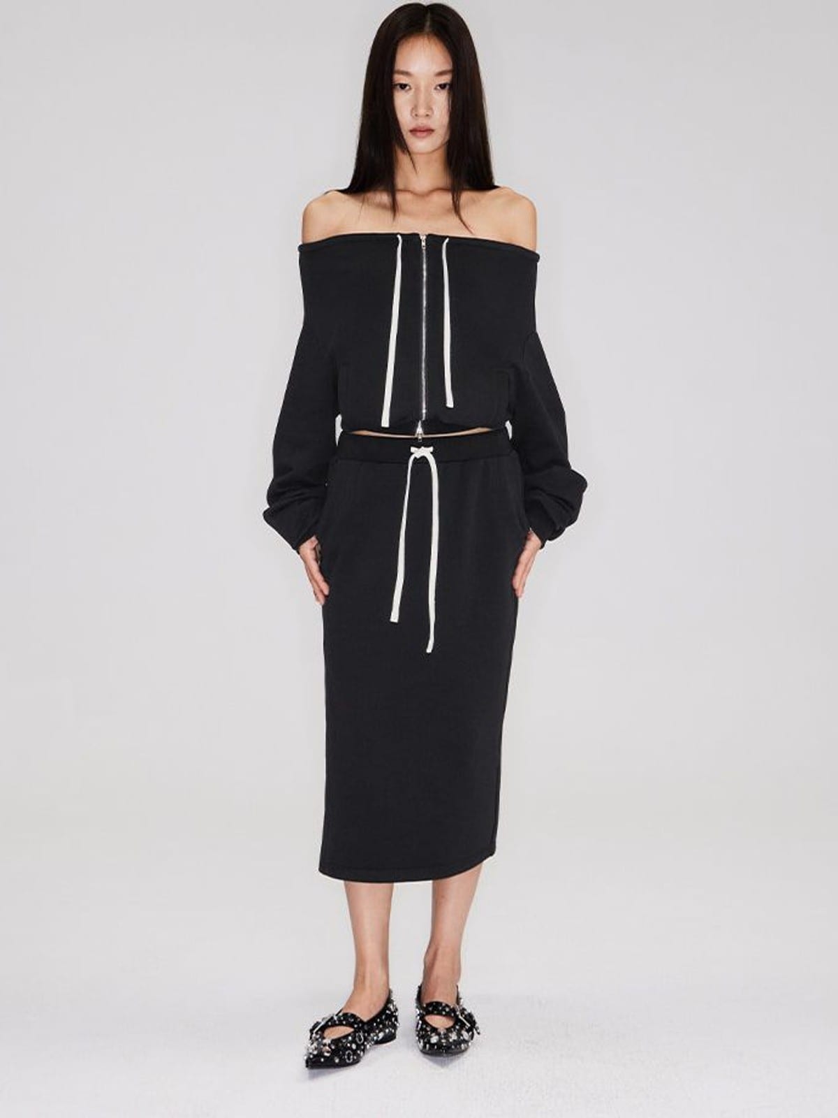 RARELY ALIKE Cotton Side Slit Midi Skirt in Black - On Female Model