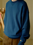 USAGE Reversible Cotton Crewneck Sweatshirt in Blue - On Male Model