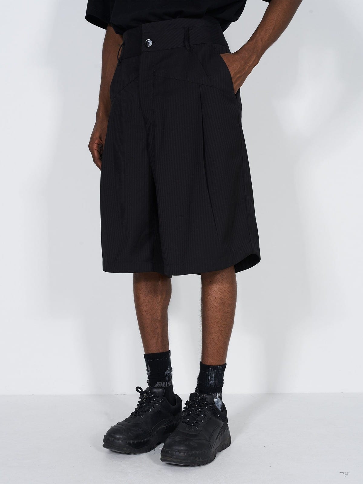 BLINDNOPLAN Asymmetric Striped Suit Shorts in Black - On Male Model