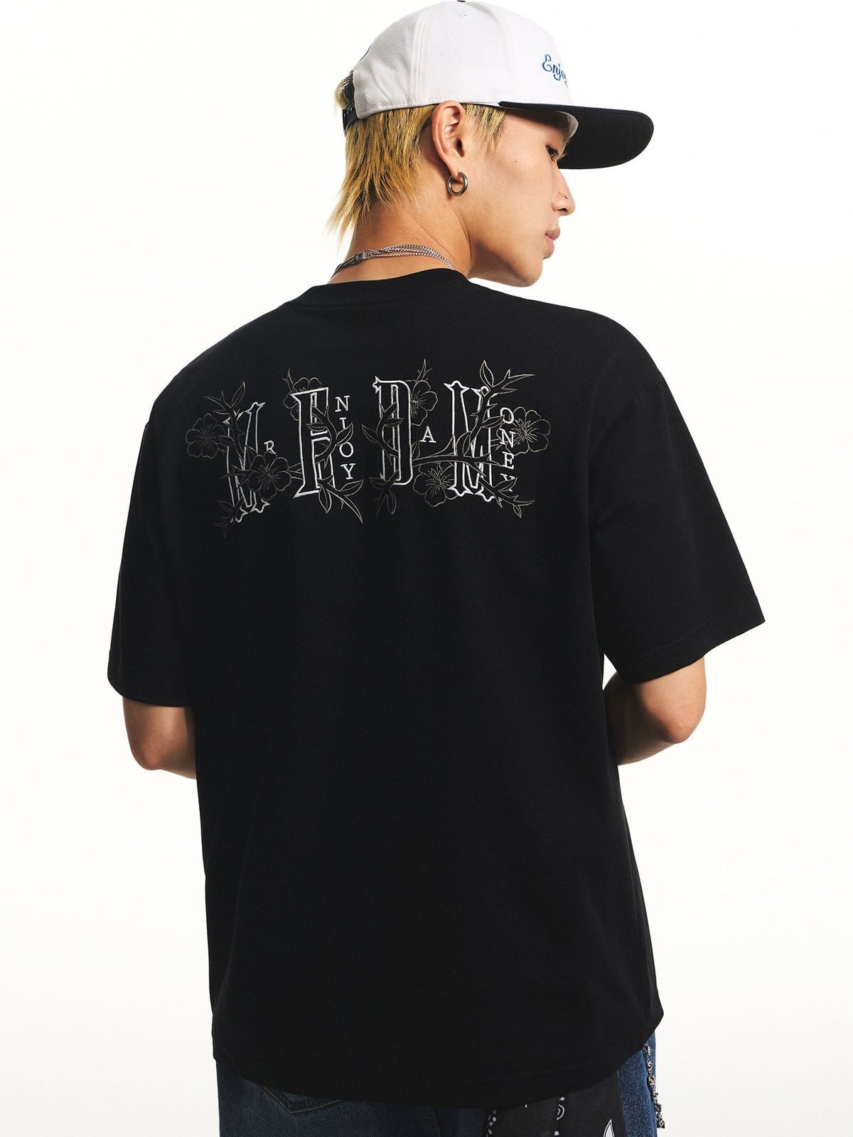 MEDM Floral Graphic Cotton Sorona T Shirt in Black - On Model