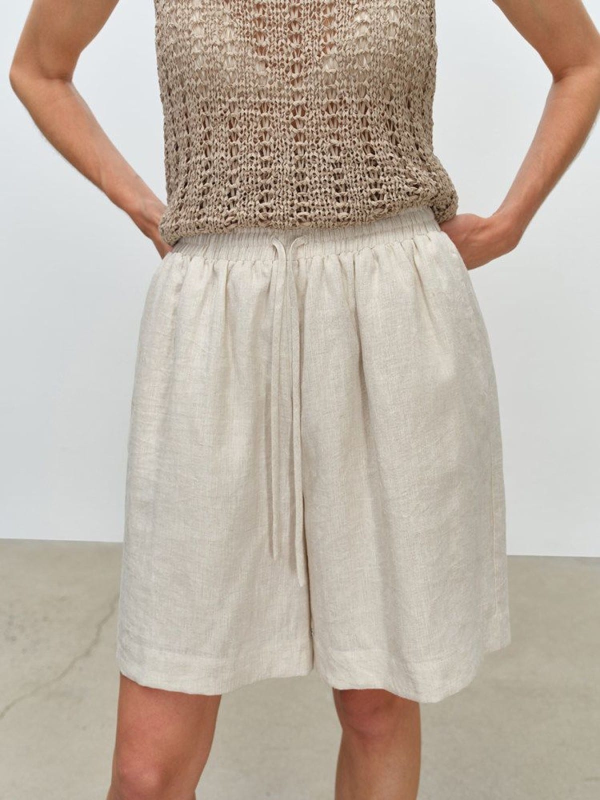 MSBEAST 100 Linen Knee Length Shorts in Beige - On Female Model