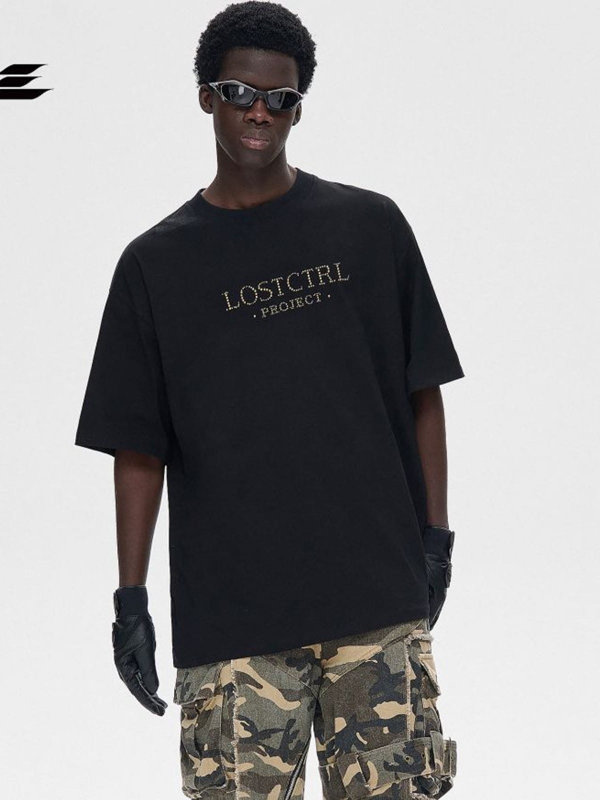 LOSTCTRL Heavyweight Cotton Rivet Logo T Shirt in Black - On Male Model